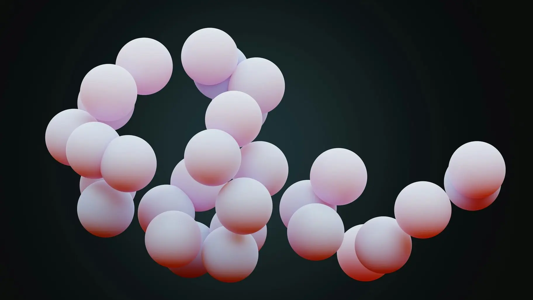 a group of pink balls floating in the air